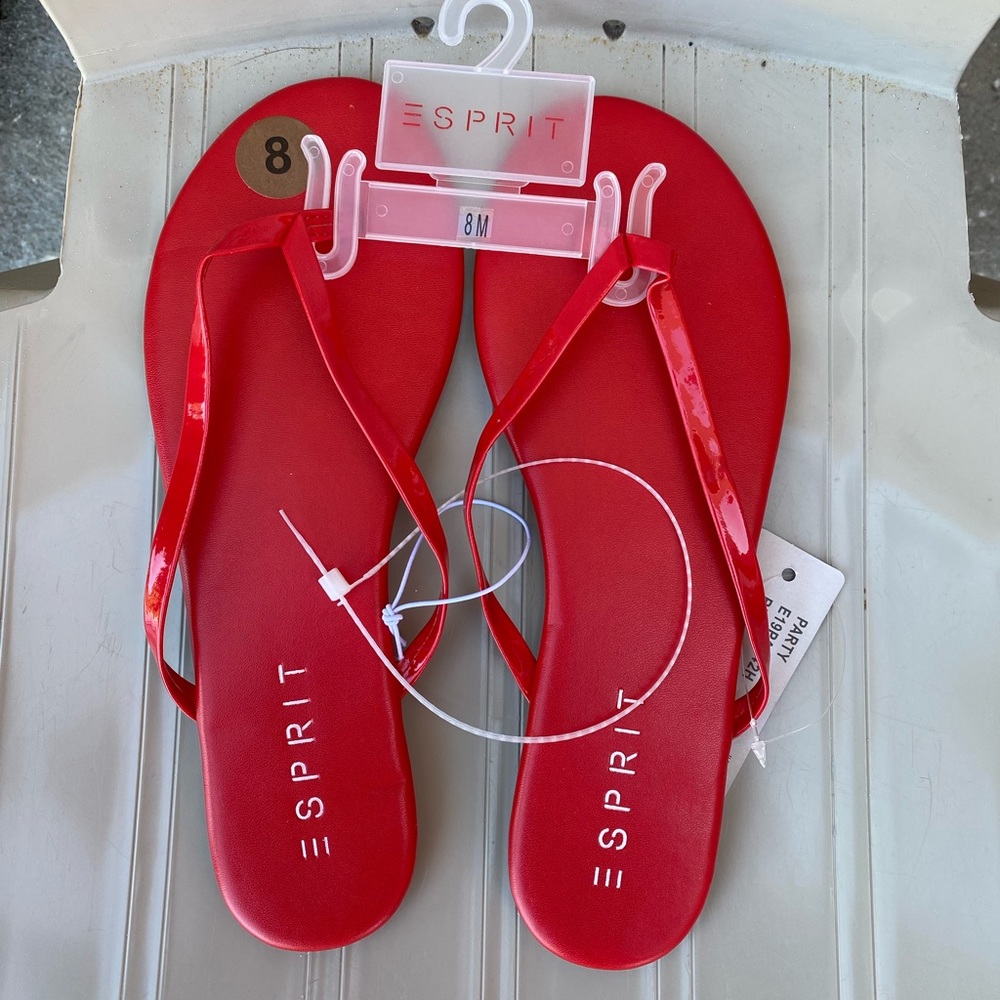 Red sandals in size 7, new. The size on the picture is not correct, it’s size 7